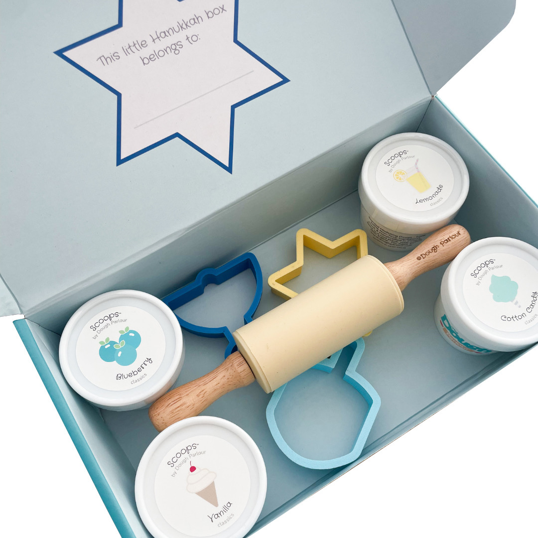 Hanukkah Playbox lid open to show dough, cutters, and optional rolling pin