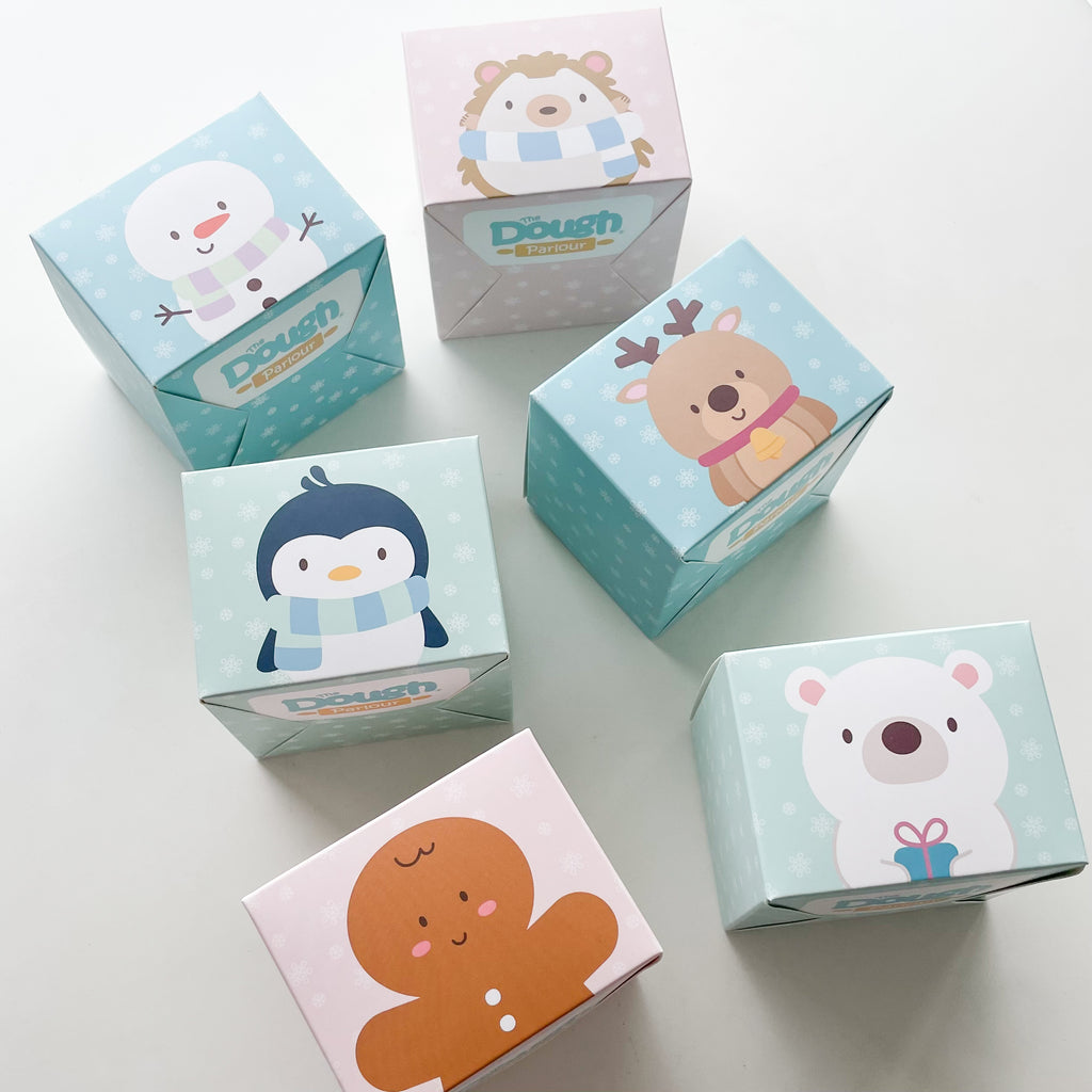 Winter Parlour Pals®, Snowman, Hedgehog, Penguin, Reindeer, Gingerbread Man, and Polar Bear, in cute little favor boxes for gifting tubs of dough