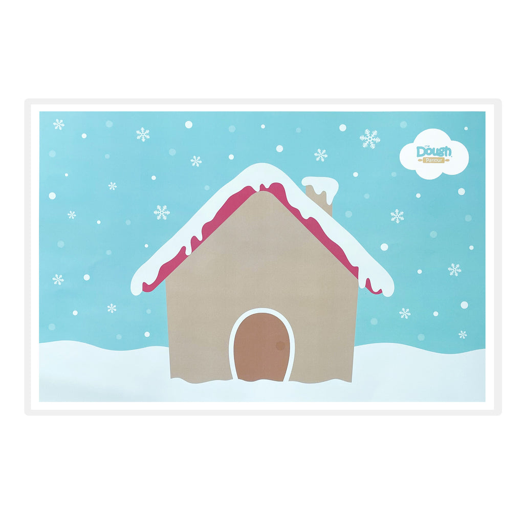 Gingerbread Playmat back, showing a snow covered house to decorate with dough