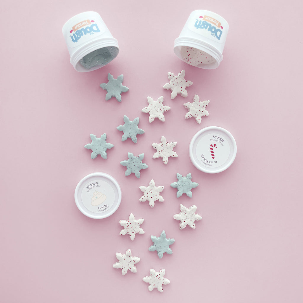 snowflakes made out of glitter filled modelling dough